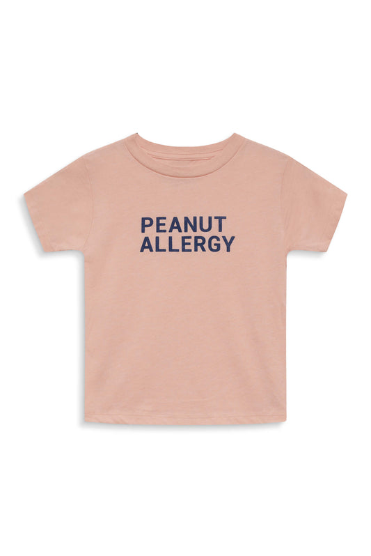 peach toddler t-shirt with navy peanut allergy text
